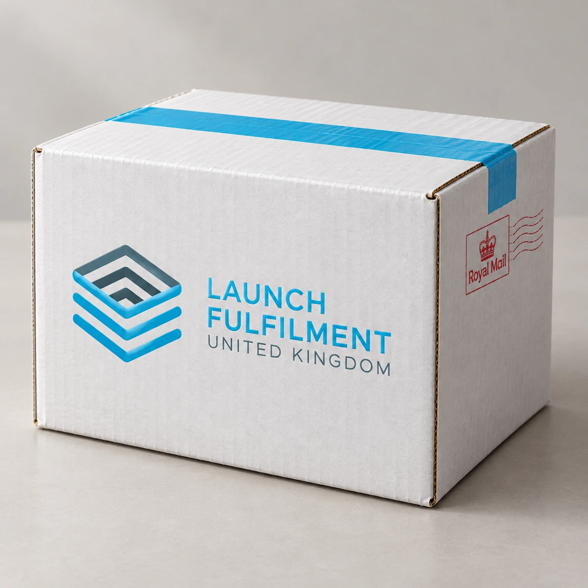 Concept packaging mockup: Launch UK branded shipping box with a Royal Mail stamp, photographed on a table.